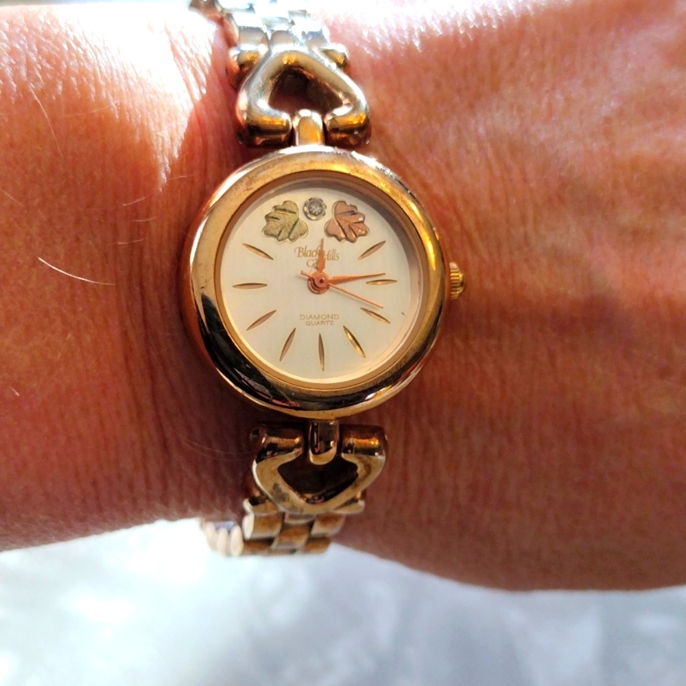 Black Hills gold diamond quartz watch.